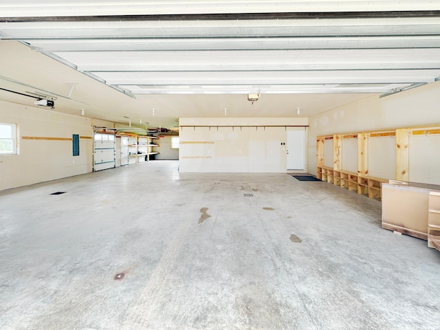 39847 447th St, Sauk Centre Twp, MN 56378 - garage featuring a garage door opener and electric panel