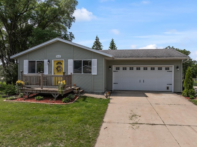 2452 Parkview Ln SE, Rochester, MN 55904 - view of front of house featuring an attached garage, concrete driveway, a front yard, a wooden deck, and roof with shingles