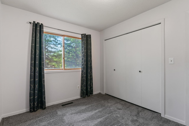 2452 Parkview Ln SE, Rochester, MN 55904 - unfurnished bedroom with carpet floors, a closet, and baseboards