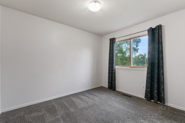 2452 Parkview Ln SE, Rochester, MN 55904 - carpeted spare room with a textured ceiling and baseboards