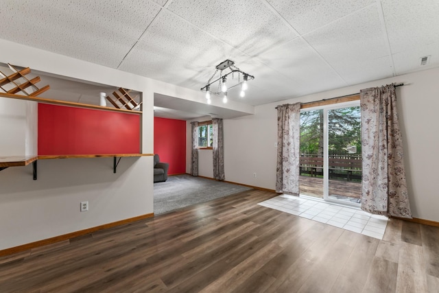 2452 Parkview Ln SE, Rochester, MN 55904 - spare room featuring baseboards and wood finished floors