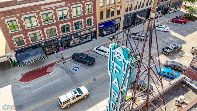 319 Broadway N Unit 306, Fargo, ND 58102 - view of building exterior featuring uncovered parking