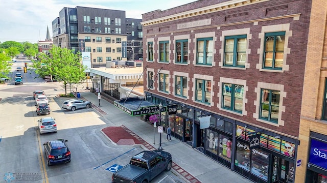 319 Broadway N Unit 306, Fargo, ND 58102 - view of building exterior with uncovered parking