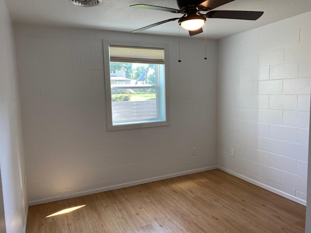 411 Broadway St, Redwood Falls, MN 56283 - spare room with light wood-style floors and ceiling fan
