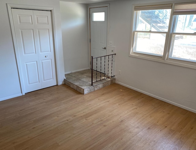 411 Broadway St, Redwood Falls, MN 56283 - entrance foyer with baseboards and wood finished floors