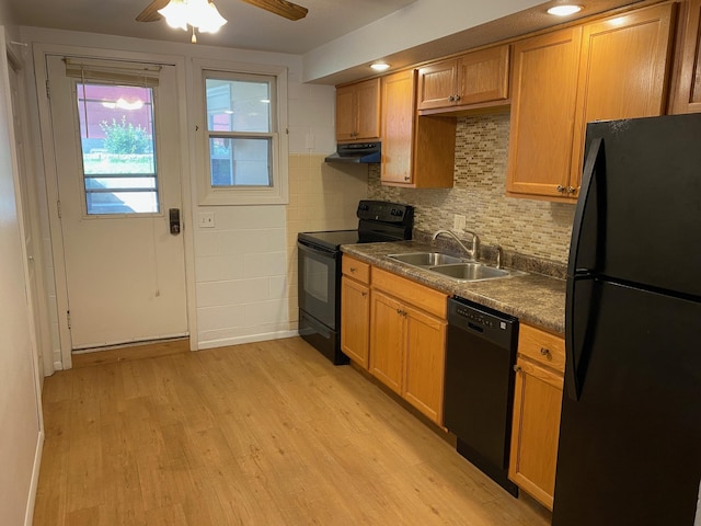 411 Broadway St, Redwood Falls, MN 56283 - kitchen featuring black appliances, under cabinet range hood, light wood-style floors, a ceiling fan, and tasteful backsplash