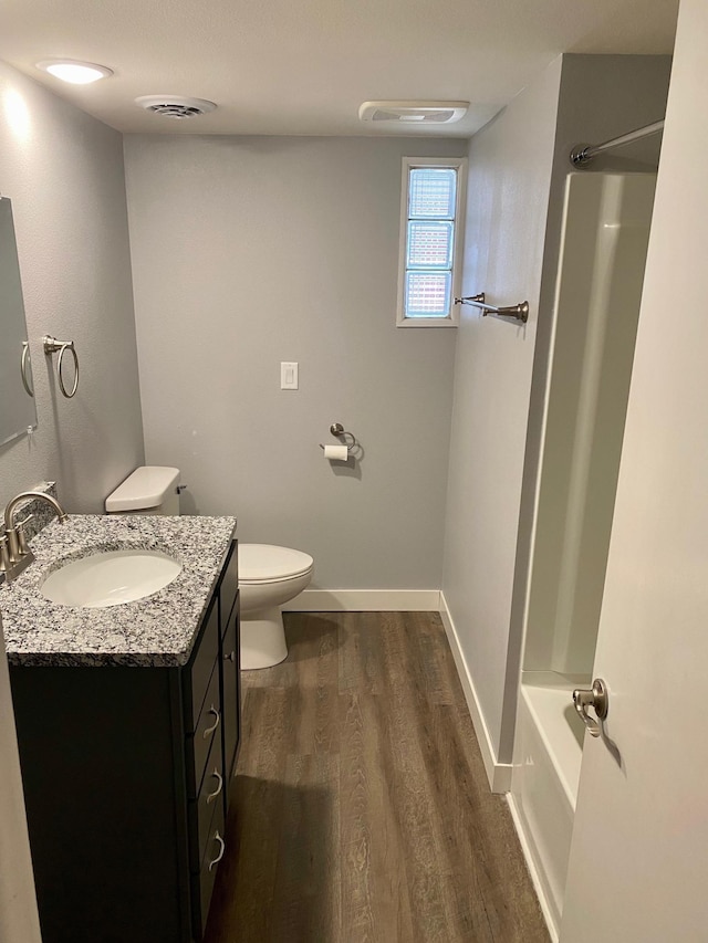 411 Broadway St, Redwood Falls, MN 56283 - bathroom with vanity and wood finished floors