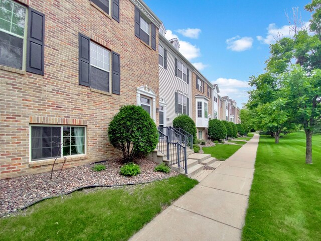 15579 June Grass Ln, Eden Prairie, MN 55347 - view of building exterior with a residential view