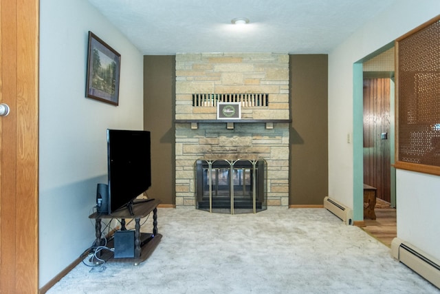 2103 Graydon Ave, Brainerd, MN 56401 - carpeted living area with a baseboard heating unit, a fireplace, and baseboards