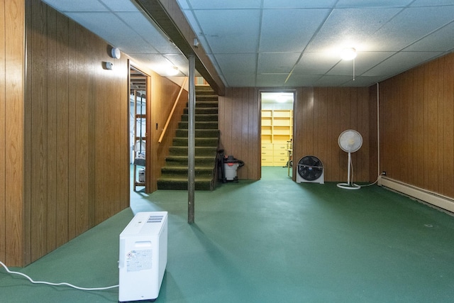 2103 Graydon Ave, Brainerd, MN 56401 - finished below grade area with wood walls, stairs, a drop ceiling, and baseboard heating