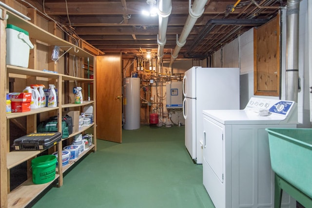 2103 Graydon Ave, Brainerd, MN 56401 - unfinished basement featuring washing machine and dryer, gas water heater, freestanding refrigerator, a sink, and water heater