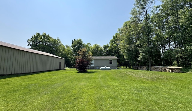 38634 241st St, Aitkin, MN 56431 - view of grassy yard with a pole building