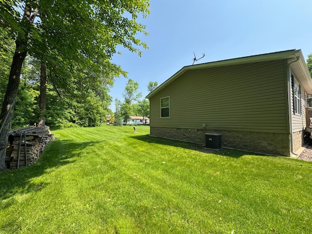 38634 241st St, Aitkin, MN 56431 - view of green lawn with central AC