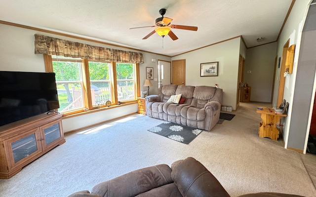 38634 241st St, Aitkin, MN 56431 - living area featuring carpet flooring, crown molding, ceiling fan, a textured ceiling, and baseboards