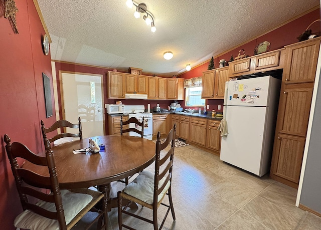 38634 241st St, Aitkin, MN 56431 - dining space with a textured ceiling and crown molding