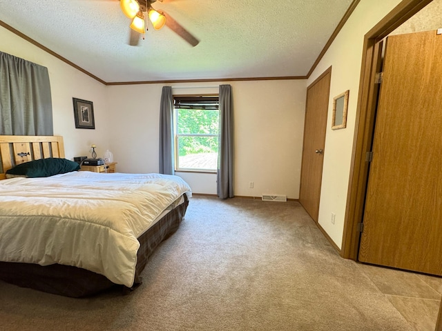 38634 241st St, Aitkin, MN 56431 - carpeted bedroom with crown molding, a textured ceiling, and a ceiling fan