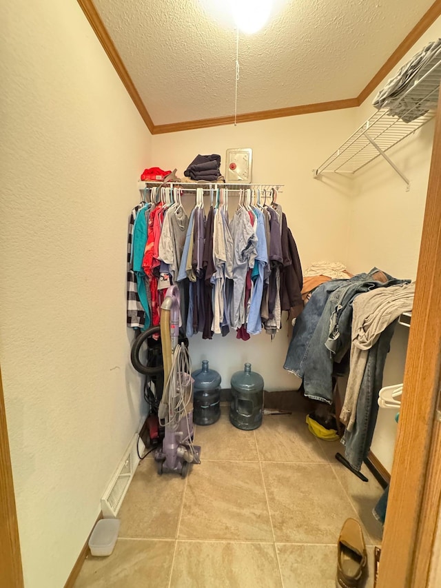 38634 241st St, Aitkin, MN 56431 - walk in closet featuring tile patterned floors