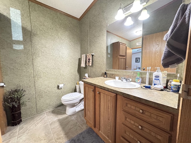 38634 241st St, Aitkin, MN 56431 - bathroom with crown molding, vanity, toilet, and tile patterned floors
