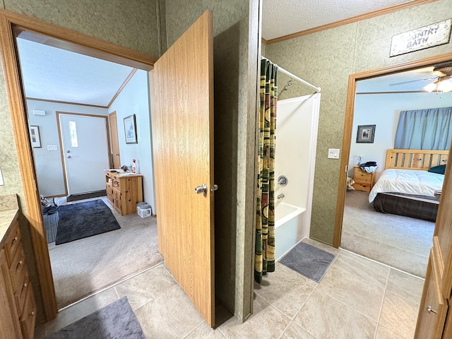 38634 241st St, Aitkin, MN 56431 - full bath featuring crown molding, vanity, ensuite bathroom, shower / tub combo with curtain, and tile patterned floors