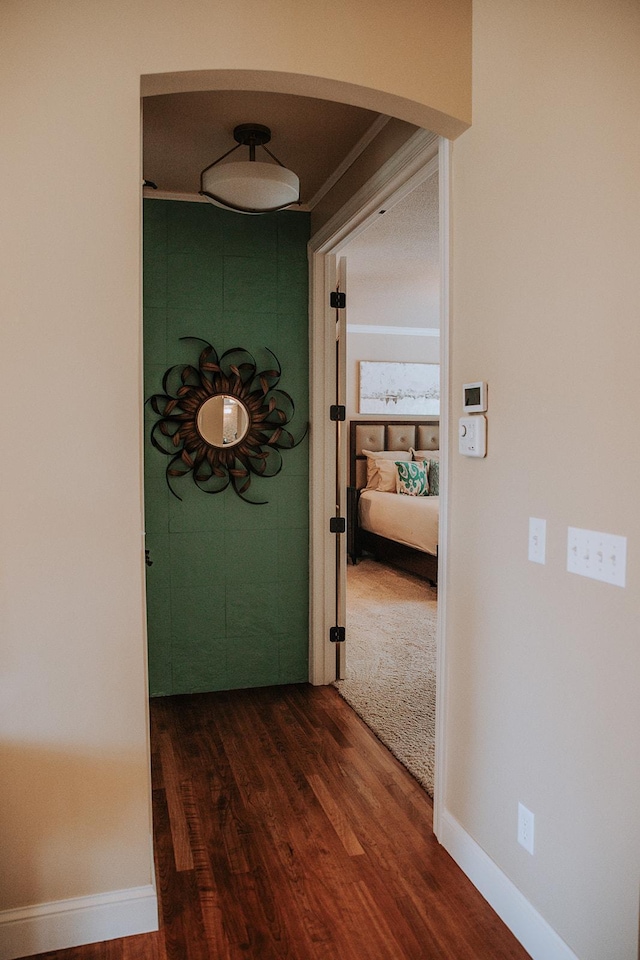 1509 Haller Ct S, Maplewood, MN 55119 - corridor featuring wood finished floors and arched walkways
