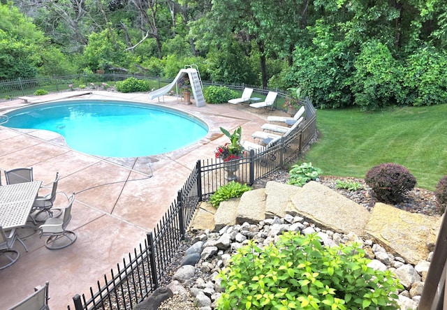 1509 Haller Ct S, Maplewood, MN 55119 - view of swimming pool featuring a water slide, a patio, and a diving board