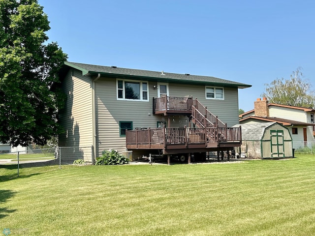 1922 13th Ave N, Moorhead, MN 56560 - rear view of house with a shed and a wooden deck
