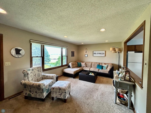 1922 13th Ave N, Moorhead, MN 56560 - carpeted living area with a textured ceiling and recessed lighting