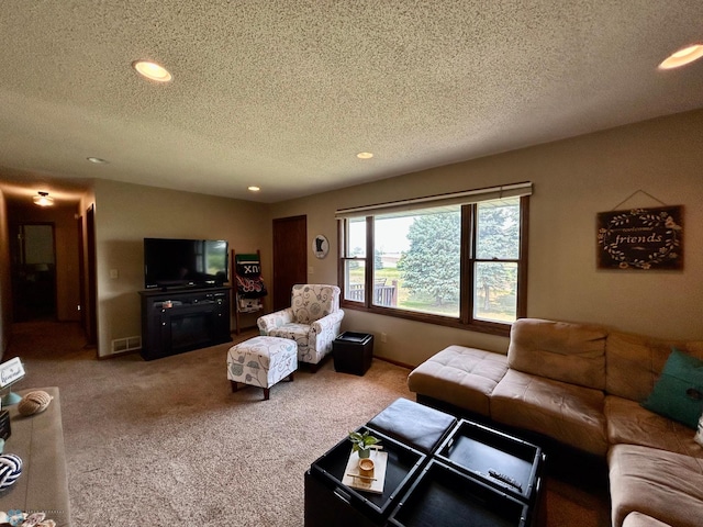 1922 13th Ave N, Moorhead, MN 56560 - carpeted living room with a textured ceiling and recessed lighting