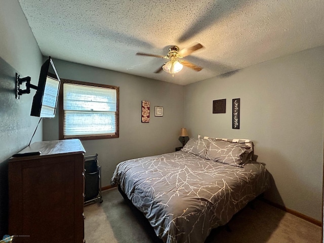 1922 13th Ave N, Moorhead, MN 56560 - carpeted bedroom with a textured ceiling and a ceiling fan