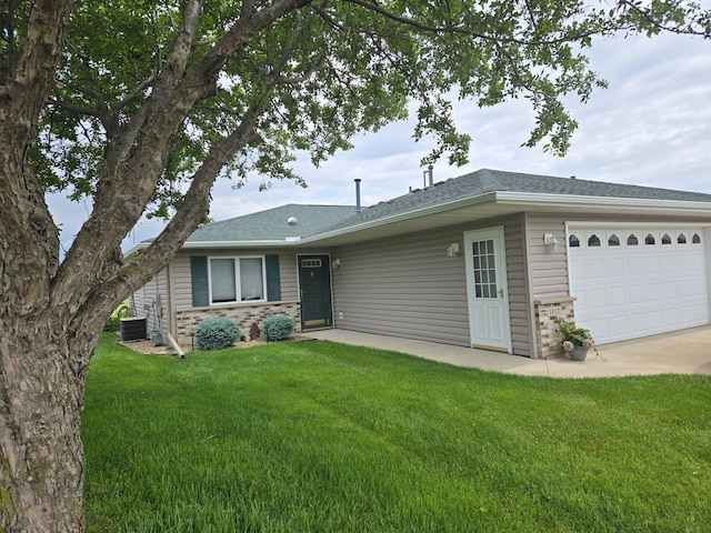 1812 Clubhouse Dr NE, Stewartville, MN 55976 - ranch-style home with an attached garage, brick siding, driveway, a front yard, and central AC unit