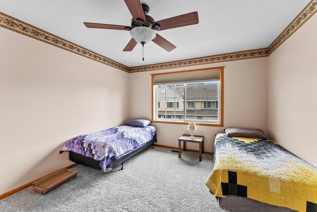 315 Roosevelt St S Unit B, Cambridge, MN 55008 - bedroom featuring carpet flooring, a ceiling fan, and baseboards