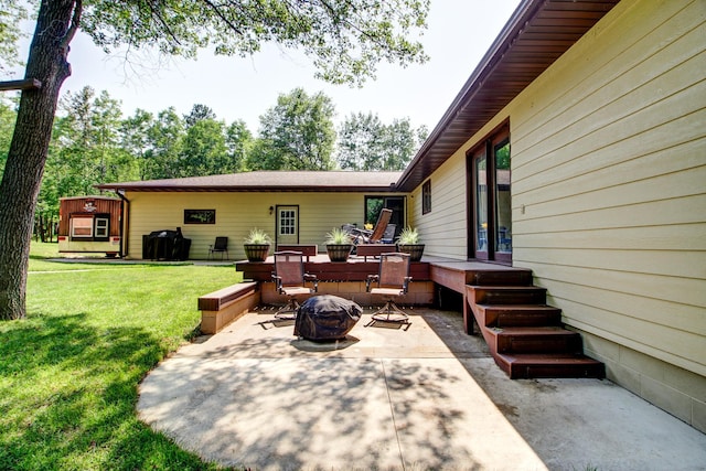 305 Birch Briar Ln, Park Rapids, MN 56470 - view of patio / terrace with an outdoor fire pit