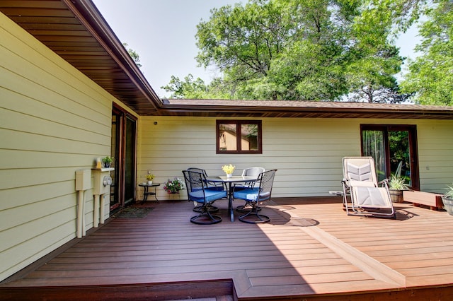 305 Birch Briar Ln, Park Rapids, MN 56470 - wooden deck featuring outdoor dining space
