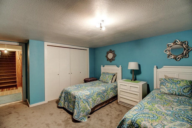 305 Birch Briar Ln, Park Rapids, MN 56470 - carpeted bedroom with a closet and a textured ceiling
