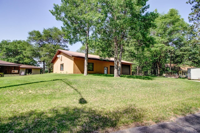 305 Birch Briar Ln, Park Rapids, MN 56470 - view of grassy yard featuring an attached garage