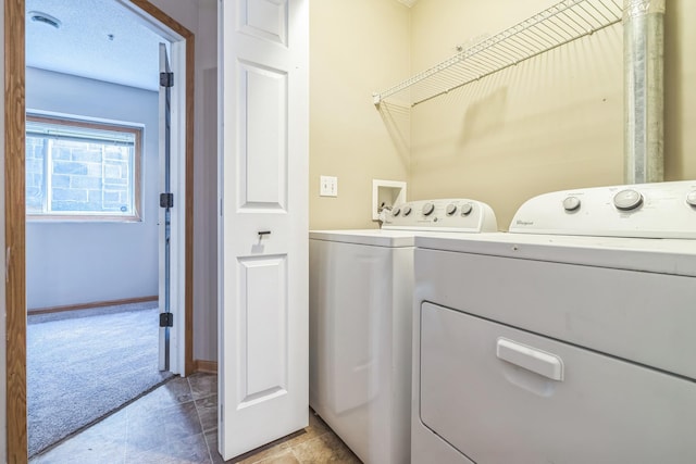 8812 Brunswick Path, Inver Grove Heights, MN 55076 - laundry area featuring washing machine and dryer, light carpet, and light tile patterned flooring