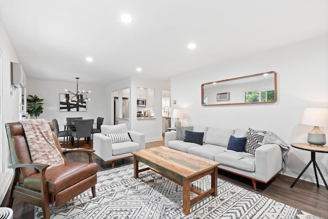 3850 Plymouth Blvd Unit 212, Plymouth, MN 55446 - living room with a chandelier, wood finished floors, recessed lighting, and an AC wall unit