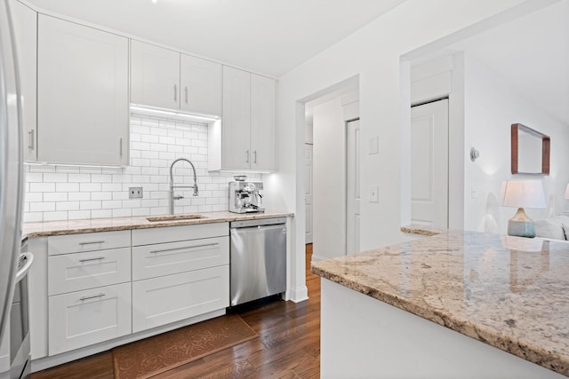 3850 Plymouth Blvd Unit 212, Plymouth, MN 55446 - kitchen with dishwasher, dark wood-style floors, white cabinetry, and light stone counters