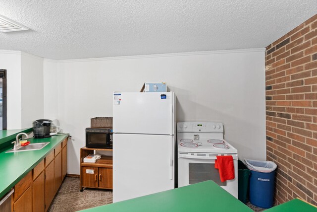 3850 Plymouth Blvd Unit 212, Plymouth, MN 55446 - kitchen with white appliances, brick wall, a textured ceiling, and crown molding