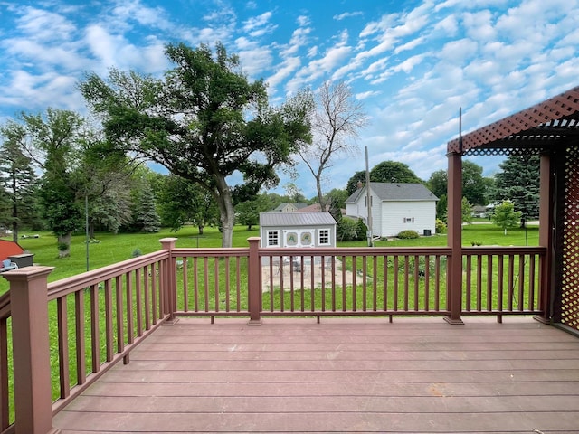 605 13th St, Mountain Lake, MN 56159 - wooden deck with an outbuilding and a yard