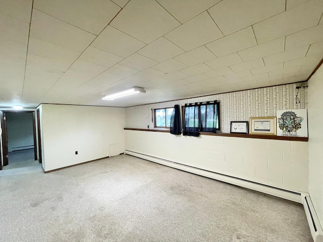 605 13th St, Mountain Lake, MN 56159 - basement with a baseboard heating unit and carpet floors