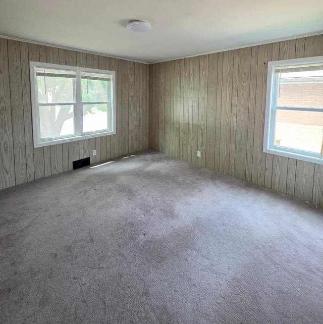 2512 7th Ave E, Hibbing, MN 55746 - carpeted empty room featuring healthy amount of natural light