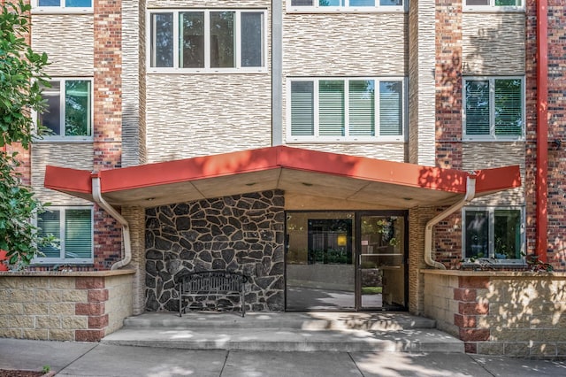 1901 Emerson Ave S Unit 303, Minneapolis, MN 55403 - doorway to property with brick siding and stone siding