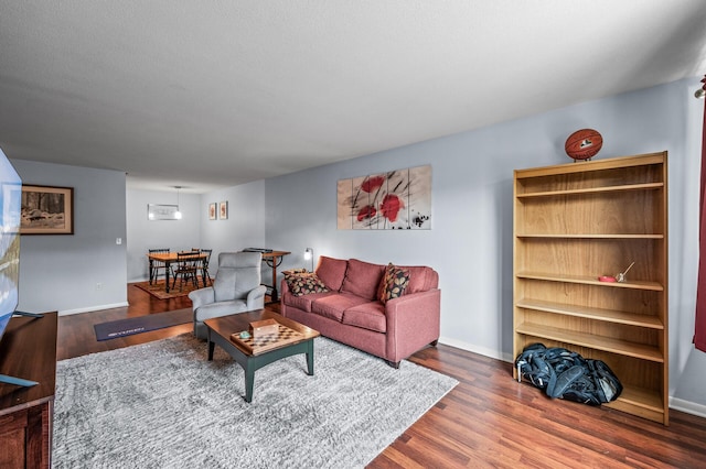 1901 Emerson Ave S Unit 303, Minneapolis, MN 55403 - living area featuring wood finished floors and baseboards