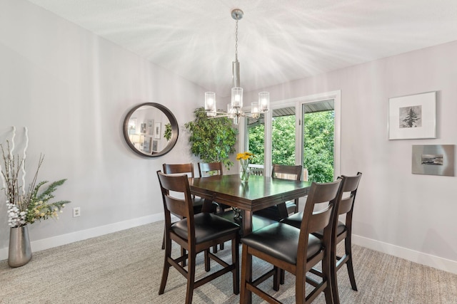6368 Pheasant Ct, Edina, MN 55436 - dining area featuring a chandelier, light colored carpet, and baseboards