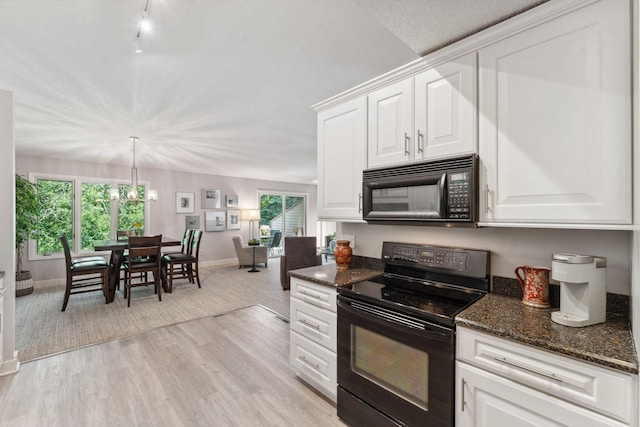 6368 Pheasant Ct, Edina, MN 55436 - kitchen with black appliances, baseboards, white cabinetry, and dark stone countertops