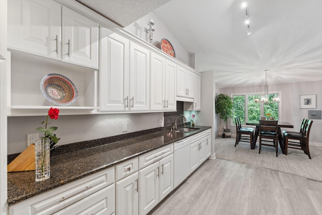 6368 Pheasant Ct, Edina, MN 55436 - kitchen with dishwasher, a sink, white cabinets, light wood-type flooring, and baseboards
