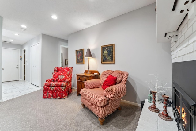 6368 Pheasant Ct, Edina, MN 55436 - sitting room with a fireplace, recessed lighting, light colored carpet, and baseboards