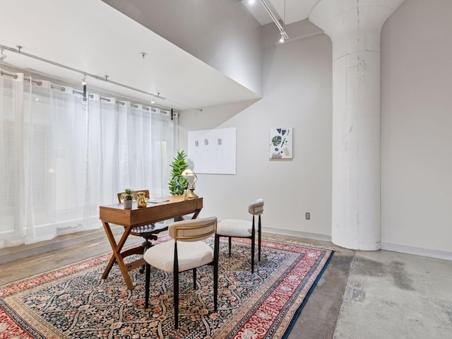 730 Stinson Blvd Unit 106, Minneapolis, MN 55413 - dining space featuring concrete flooring and track lighting