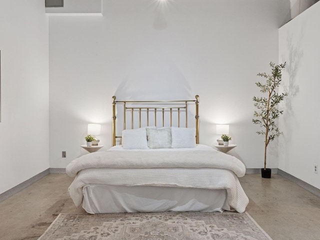 730 Stinson Blvd Unit 106, Minneapolis, MN 55413 - bedroom with finished concrete floors and baseboards